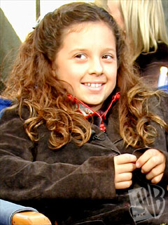 Mackenzie smiles - "That's a wrap on the 100th episode of 7th Heaven!"